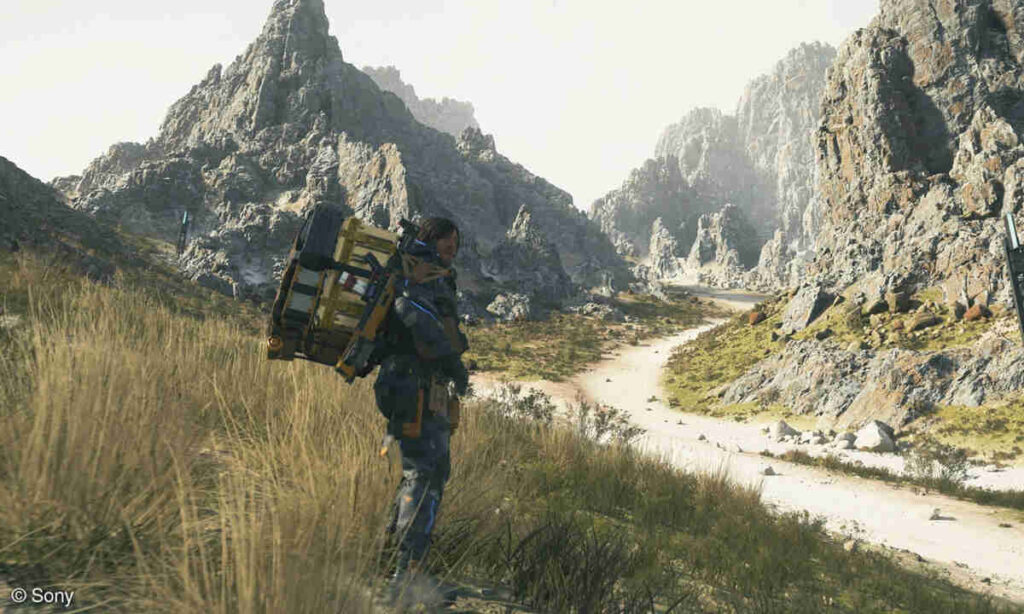 デスストランディング2 荷物を背負って進む主人公の探索シーン